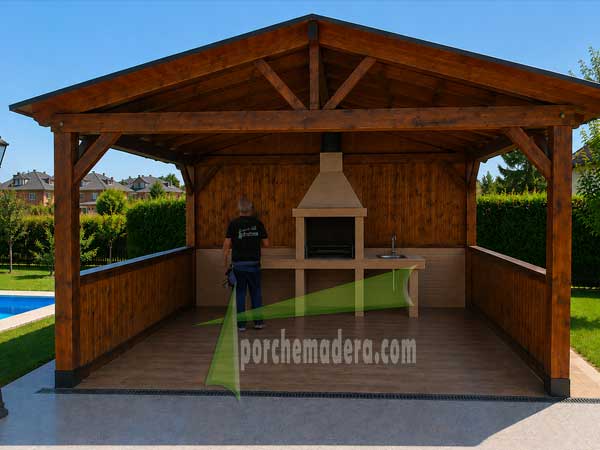 Cenador de madera con barbacoa en su interior